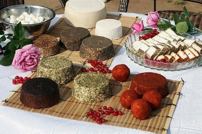 Private day tour from Vilnius to goat Cheese farm and Kernave historical capital