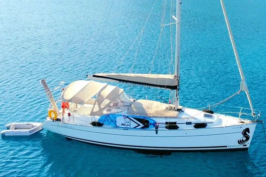 Private sailing trip to Anthony Quinn Bay and Kallithea Thermes.