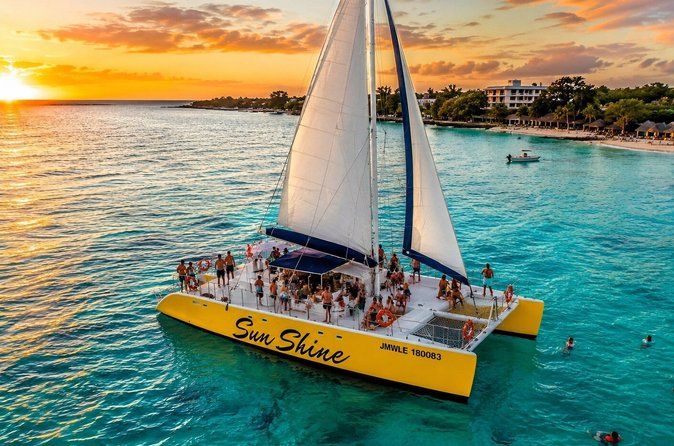 Negril Catamaran Sunset Cruise with Snorkeling, Drinks & DJ
