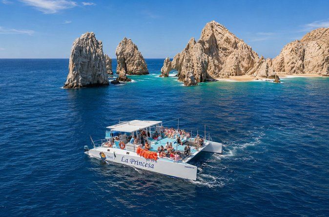 Cabo Catamaran Tour with Snorkeling and Unlimited Drinks