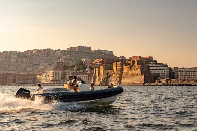 Aperitif on a boat at sunset in the Gulf of Naples