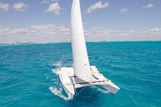 Private Half Day Catamaran Tour to Isla Mujeres with Open Bar