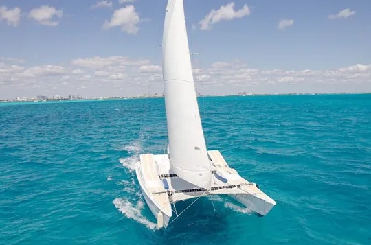Private Half Day Catamaran Tour to Isla Mujeres with Open Bar