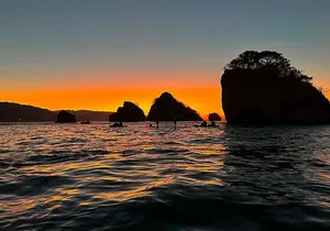 Sunset and Bioluminescence Boat Tour at Los Arcos Islands