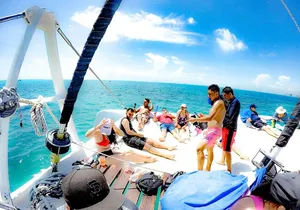 Catamaran Sail Adventure to Isla Mujeres with buffet & open bar