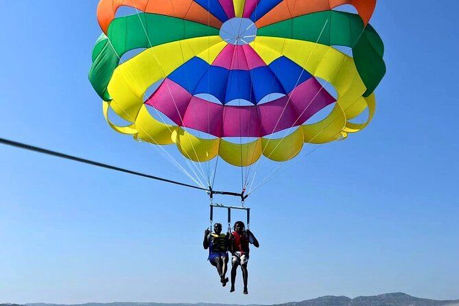 Parasailing or Jet Skiing Adventure Includes Jerk Meal