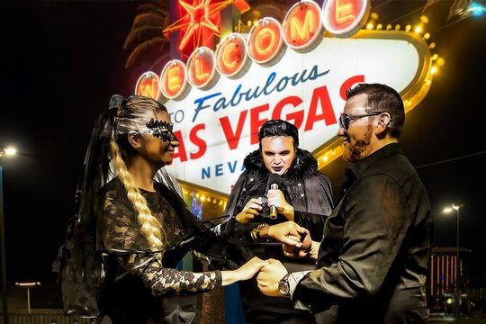 Goth Wedding or Vow Renewal at Vegas Sign with Props and Photos