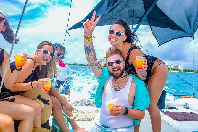 Splendid Catamaran to Isla Mujeres: drinks and fun all day!