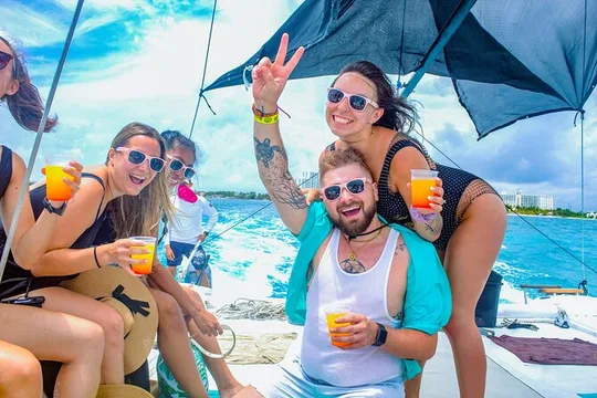 Splendid Catamaran to Isla Mujeres: drinks and fun all day!
