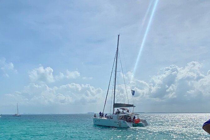 Isla Mujeres on luxury catamaran with snorkel, open bar and lunch