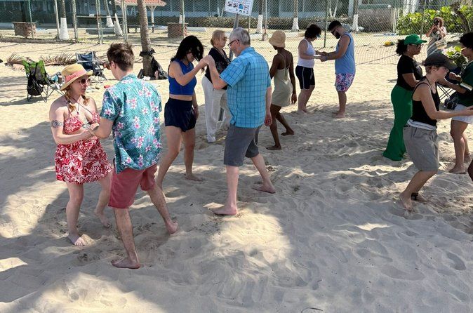 Coquito Drink and Salsa Beach Class