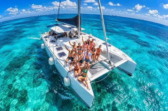 Splendid Catamaran to Isla Mujeres: drinks and fun all day!