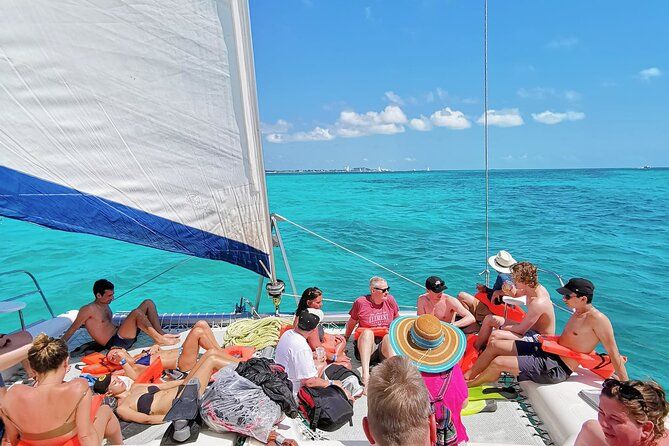 Private Catamaran to Isla Mujeres: Snorkel, Party & Beach Club