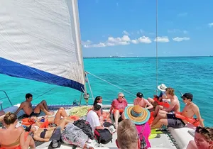 Private Catamaran to Isla Mujeres: Snorkel, Party & Beach Club