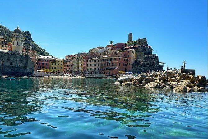 Private tour to Cinque Terre on a traditional Ligurian gozzo boat.