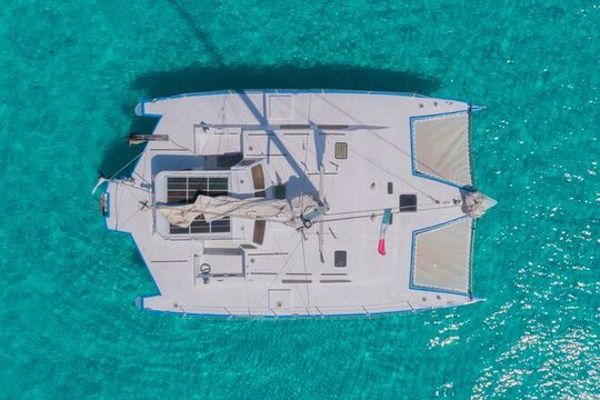 A Private Cruise to Isla Mujeres with Music and Drinks