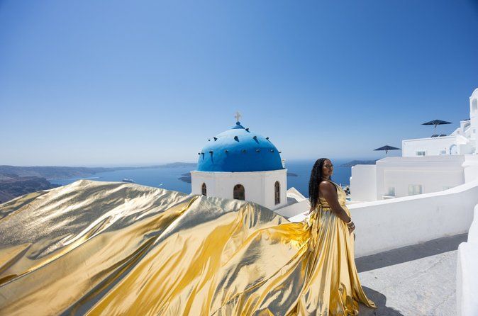 Flying Dress Photoshoot in Santorini, Blue Domes and Caldera View