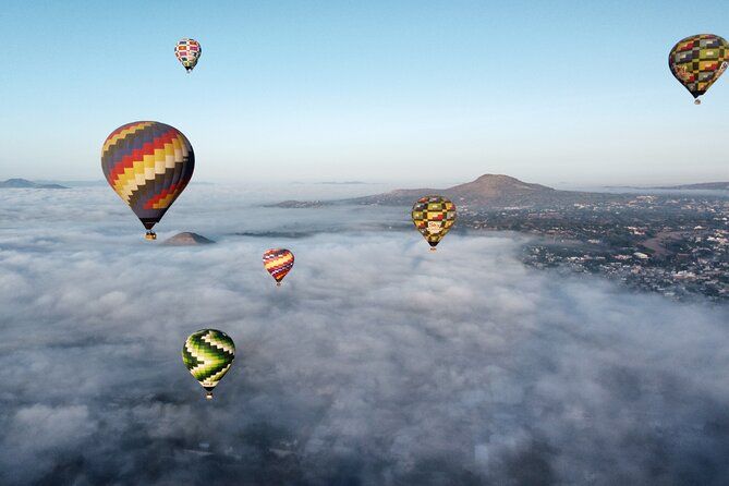 Hot Air Balloon Flight with Breakfast in Cave and Transportation