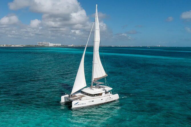 Sail to Paradise Catamaran Tour with Snorkel and Beach Club
