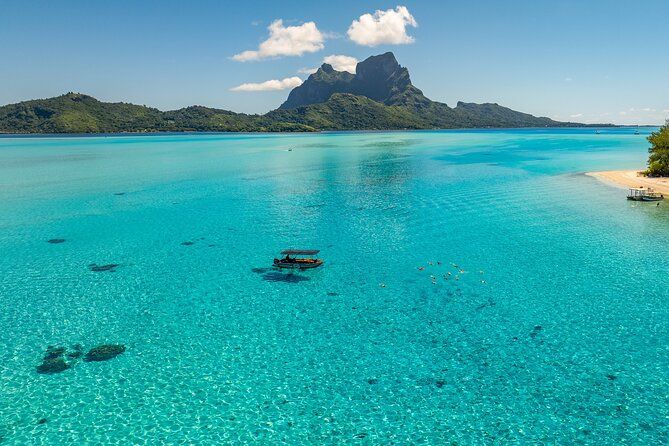 Full Day Eco Snorkeling & Traditional BBQ Lunch on a Motu