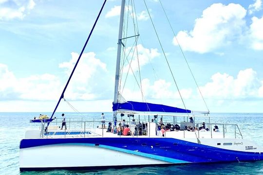 Private Isla Mujeres Sailing Catamaran Tour with Transportation