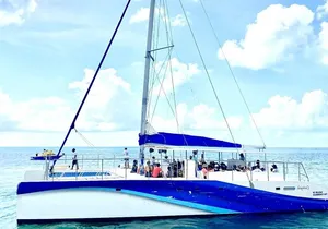 Private Isla Mujeres Sailing Catamaran Tour with Transportation