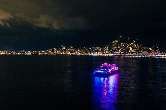 Night Party in Catamatan with Neon Lights, Live DJ and Drinks