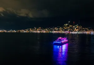 Night Party in Catamatan with Neon Lights, Live DJ and Drinks