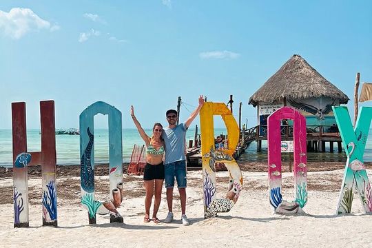 Holbox Island Trip with Boat Ride Biking and Swimming from Cancun