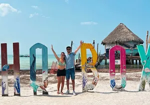 Holbox Island Trip with Boat Ride Biking and Swimming from Cancun