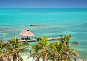 Contoy Island & Mujeres island, snorkeling & lunch on the beach.