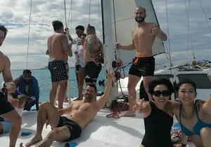 Isla Mujeres Catamaran Party Cruise with Snorkeling and Lunch