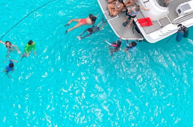 Luxury Private Yacht to Isla Mujeres with Snorkeling & Drinks