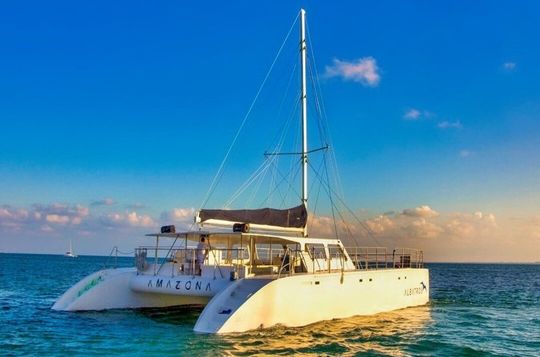 Catamaran Cruise to Isla Mujeres with Snorkeling and Lunch