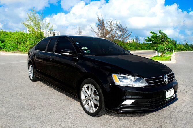 Departures in Luxury Sedan from Puerto Aventuras to CUN Airport