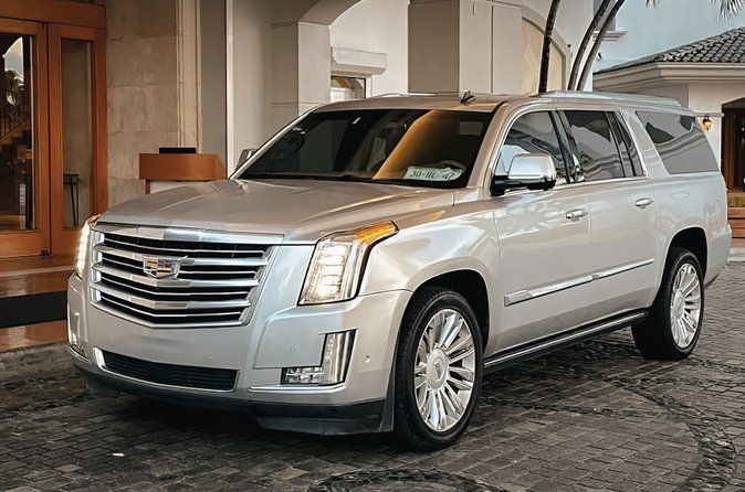 From Puerto Morelos: Private Deluxe Transport to Cancun Airport