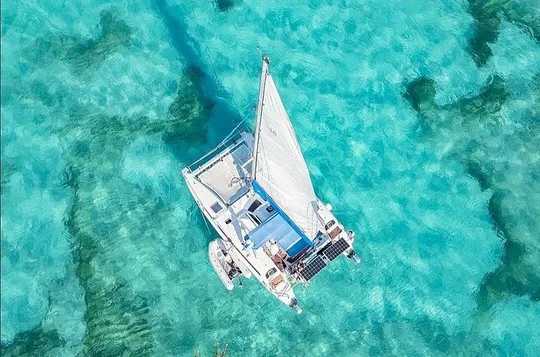 Isla Mujeres Catamaran Cruise with Snorkeling, Open Bar & Buffet